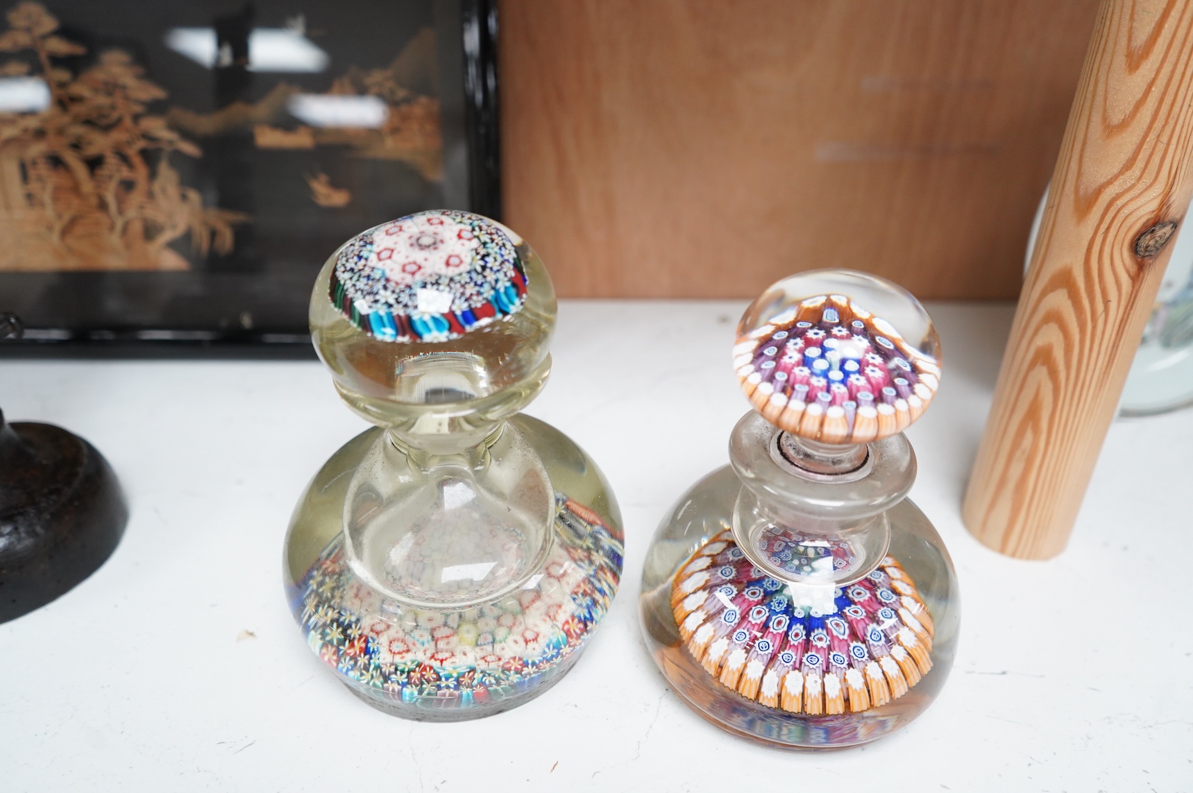 A 19th century millefiori glass inkwell and a similar 20th century inkwell. (2). Largest 16.5cm high